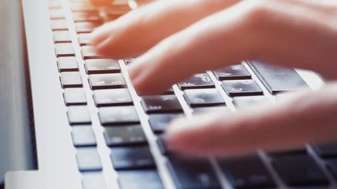 Typing on computer keyboard, closeup of fingers pressing keys Stock Footage 93643127