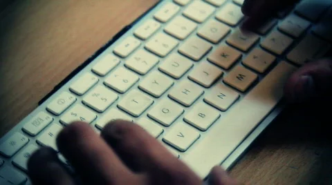 Typing on a computer keyboard Stock Footage 744426