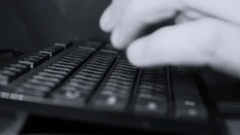 Typing on a computer keyboard Video stock 69744095