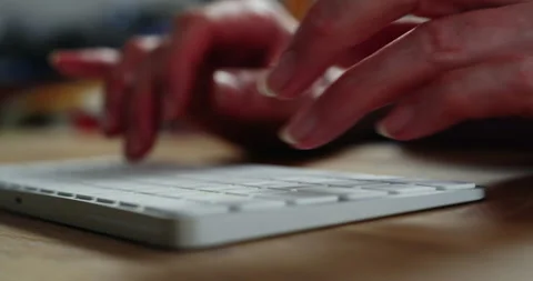 Typing on computer keyboard Stock Footage 242604646
