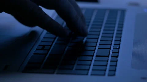 Typing on computer keyboard at night, 4K UHD Stock Footage 45082227