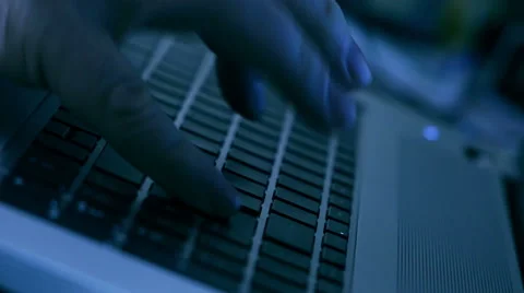 Typing on computer keyboard at night, 4K UHD Stock Footage 48134370