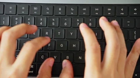 Typing on Computer Keyboard From Top View Video stock 347179006