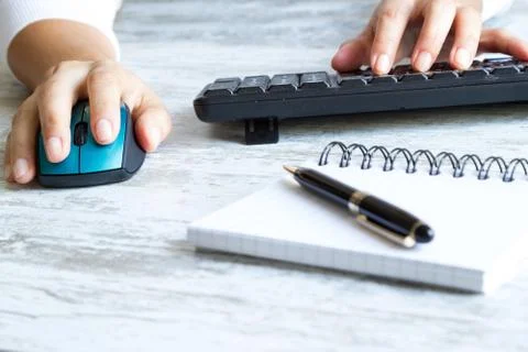 Typing on the computer Stock Photos