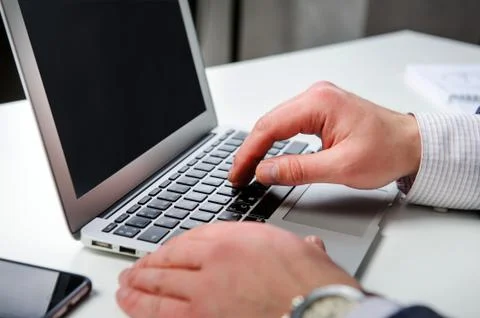 Typing on a computer Foto stock