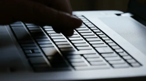 Typing on computer, tracking around Stock-Footage 48585976