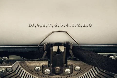 Typing countdown from ten to zero on a vintage typewriter close-up Stock Photos