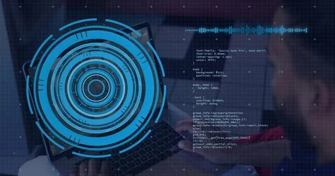 Typing developer wearing casual top at workspace, with laptop keyboard, blue HUD Stock Photos