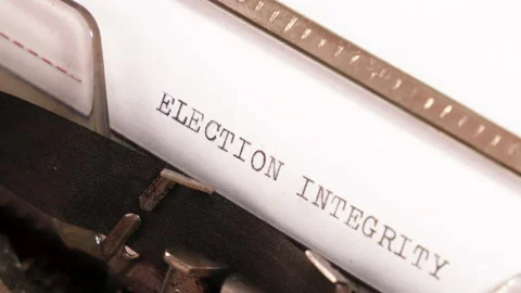 Typing ELECTION INTEGRITY on an old typewriter. 4K Stock Footage 152040803