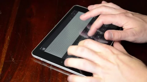 Typing on an Electronic Tablet Stock Footage 51540303