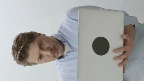 Typing email or message on laptop keyboard on white background Stock Footage 201033730