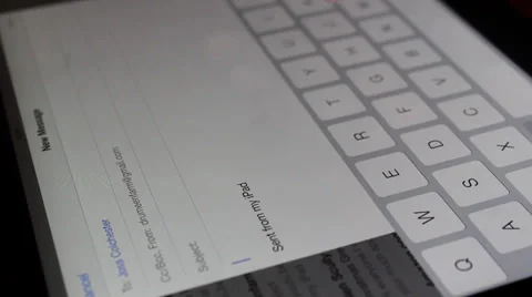 Typing email on tablet Video stock 33729575