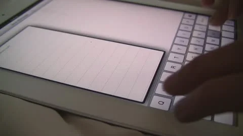 Typing an email on a virtual keypad 1 Stock Footage 10839549