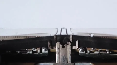 Typing THE END in black ink on an old mechanical typewriter. Stock Footage 248708139