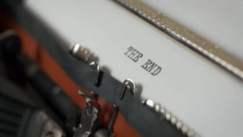 Typing "the end" on typewriter Video stock 87351719