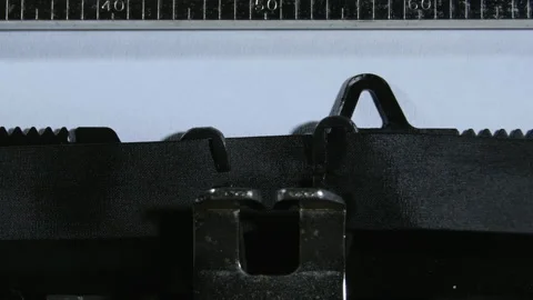 Typing the expression GUILTY with an old manual typewriter Stock Footage 168287017