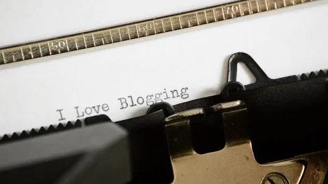 Typing the expression I Love Blogging with an old manual typewriter Stock Footage 72672011