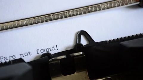 Typing the expression Page not found! with an old manual typewriter Stock Footage 72709819