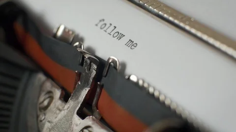 Typing "follow me" on typewriter Stock Footage 87351753