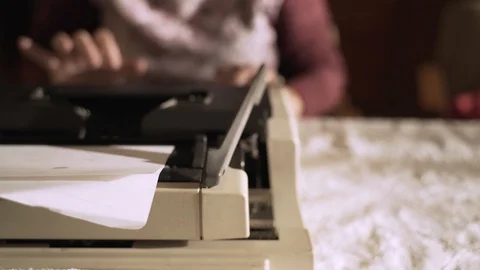 Typing Full Line on Typewriter And Hitting Return Stock Footage 120312446