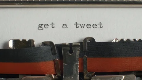 Typing "get a tweet" on typewriter Video stock 87351437