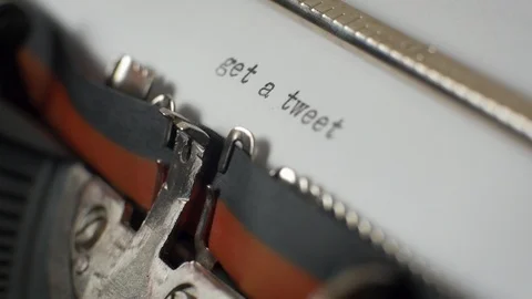 Typing "get a tweet" on typewriter Video stock 87351763