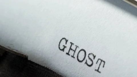 Typing GHOST on typewriter Stock-Footage 153159586