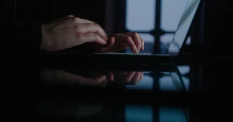 Typing hands on the keyboard, night in the office, manager types text on the Stock Footage 155380698