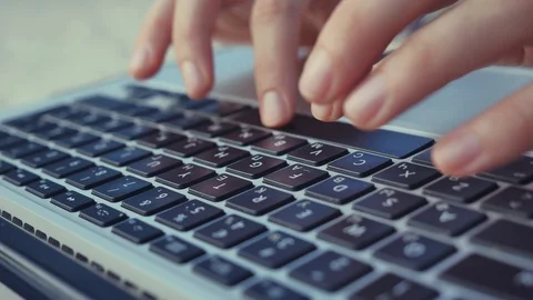 Typing hands on laptop keyboard Stock Footage 128809151