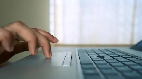 Typing Hands on Laptop Keyboard at Professional Work Desk Stock Footage 315982853