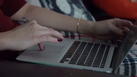 Typing hands on macbook keyboard. Hands typing computer Video stock 82348619