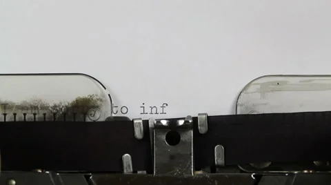 Typing I am sorry to inform you on Typewriter Stock Footage 61870412