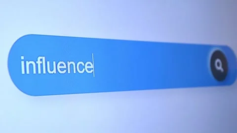 Typing "influence" in search bar, social impact and persuasion concept footage. Stock Footage 315126861