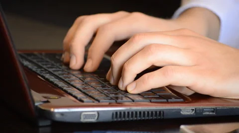 Typing On The Keybaord Of A Red Laptop Stock Footage 49662085