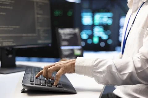 Typing, keyboard and programming with developer workstation closeup 写真素材