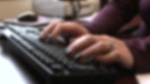 Typing on the keyboard blure 動画素材 1060507