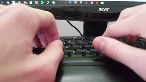Typing on a keyboard on a desk Видео 73946149