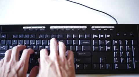 Typing on a keyboard Video stock 8928648