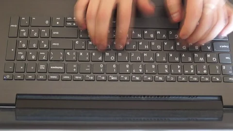 Typing on keyboard Stockbeeldmateriaal 107783627