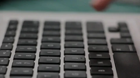 Typing on the keyboard Stock Footage 120464107