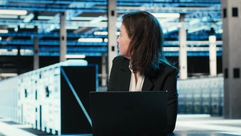 Typing on keyboard, laptop and engineer in data center Stock Footage 329323937