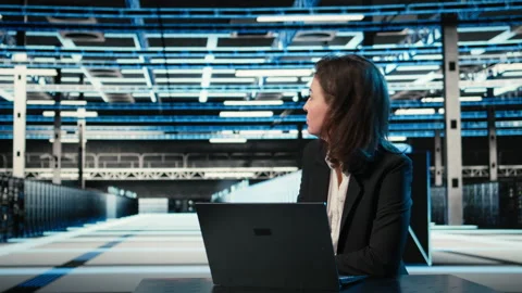 Typing on keyboard, laptop and engineer in data center Stock Footage 329332487
