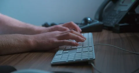 Typing keyboard man remote working, close-up slow motion, studio shot in 4K Stock-Footage 126368808