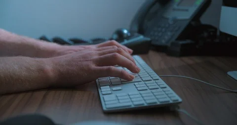 Typing keyboard man remote working, close-up slow motion, studio shot in 4K 库存影片 126368867
