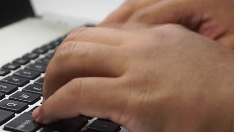 Typing on keyboard with motion blur and low FPS effect Stock Footage 313099876