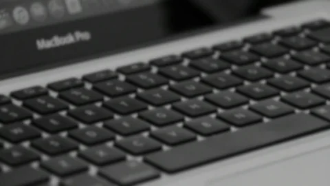 Typing keyboard notebook computer Video stock 98677389