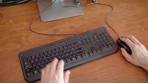 Typing on a keyboard overhead shot Stock Footage 83749711