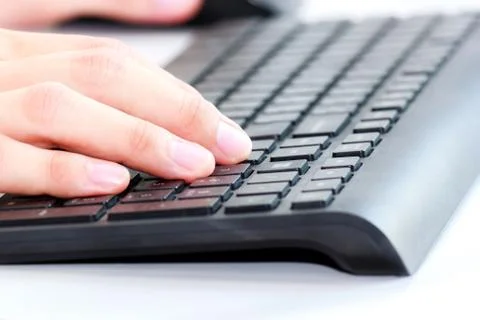 Typing on the keyboard Stock Photos