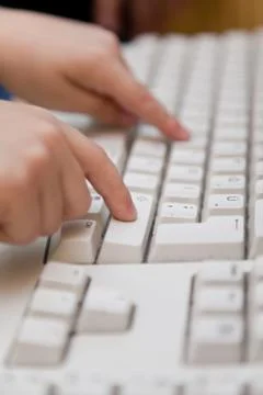 Typing on the keyboard Stock Photos