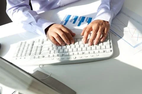 Typing on the keyboard Stock Photos